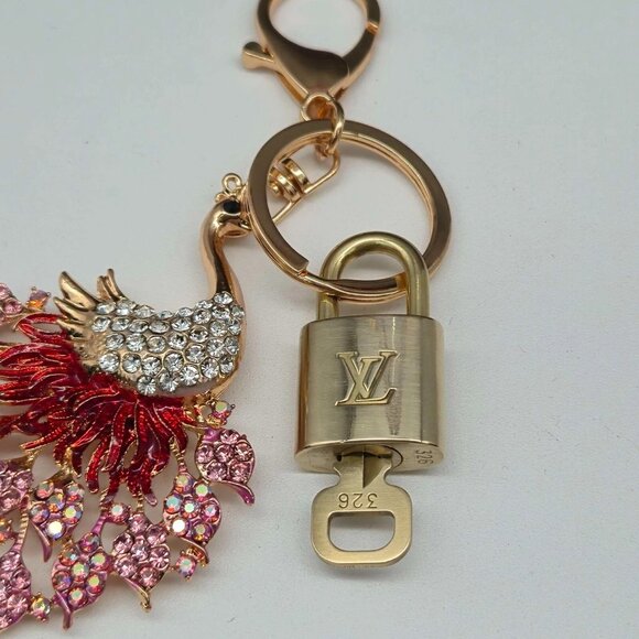 Authentic Louis Vuitton Lock & Key with unbranded Peacock Bagcharm, Keycharm - Picture 8 of 8